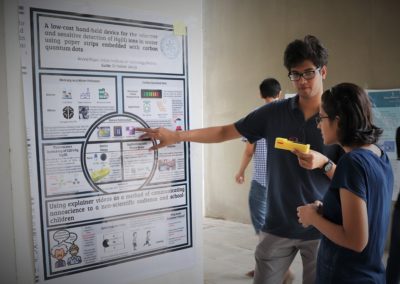 A student explaining his research project